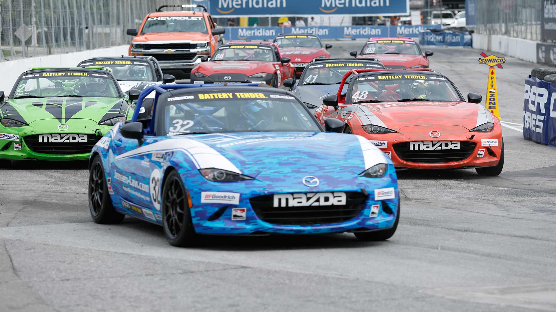 Mazda MX-5 Cup cars racing on track